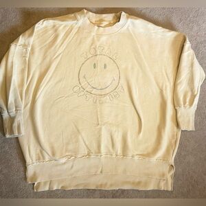 Yellow Sweatshirt with Smiley Face